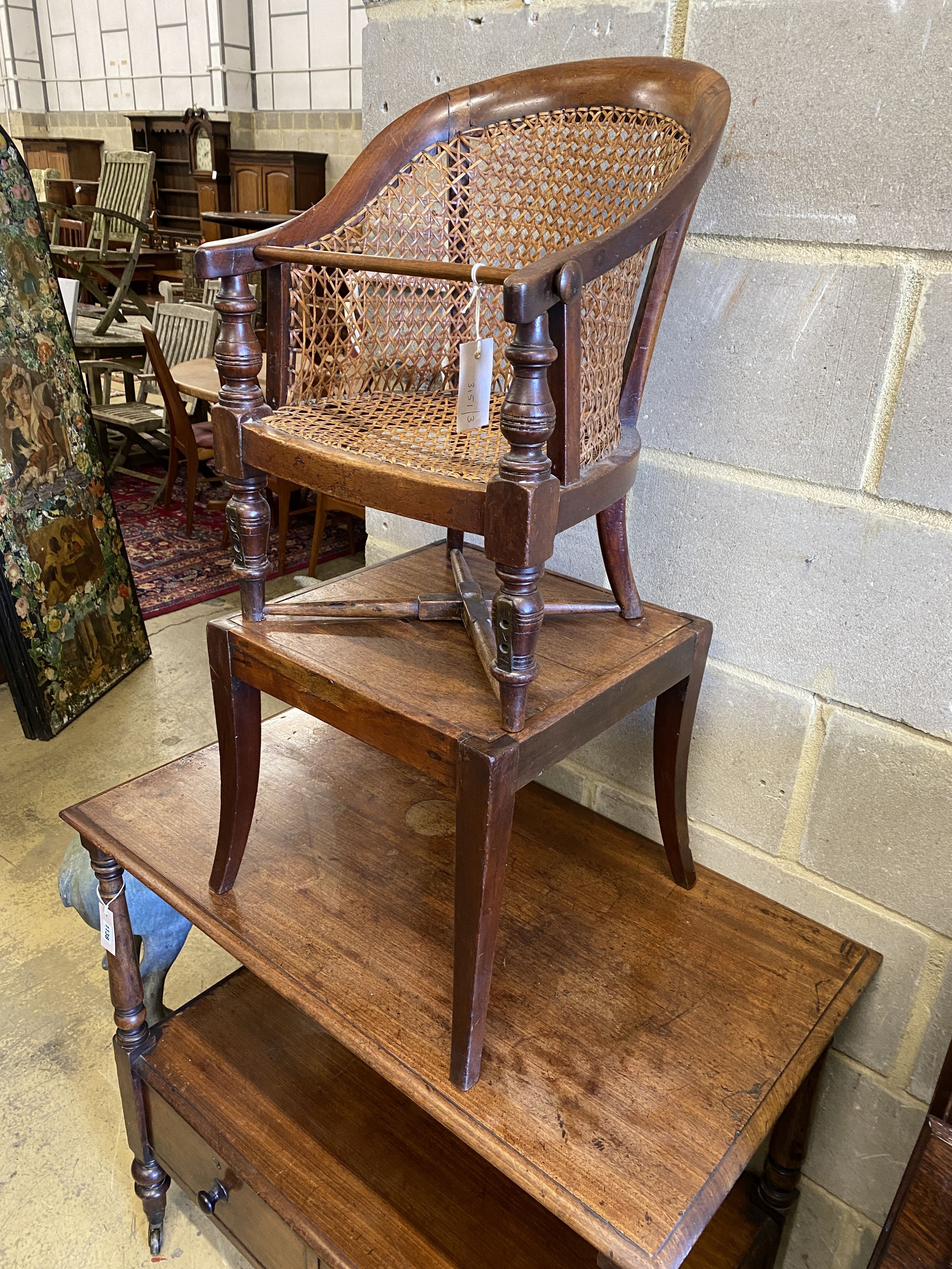 A Victorian caned mahogany child's high chair on stand, width 39cm, depth 39cm, height 90cm